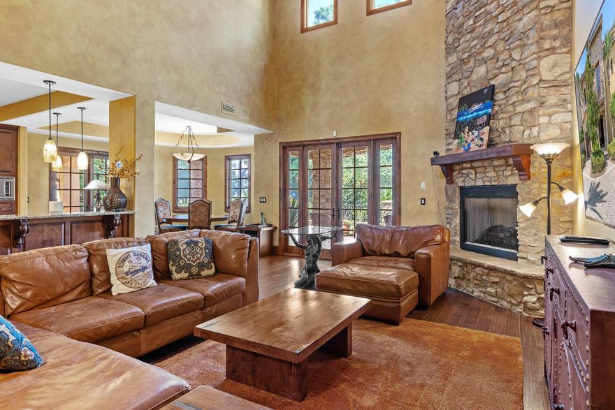 Beautiful Tuscan inspired townhouse within the gates of Sandestin.  Tuscana is unique to Sandestin with exterior features including tile roofs, turrets, stone accents and washed stucco, as well as the impressive water fountain found at the entrance. Built with entertaining in mind, you will find a covered grill area, patio, and enlarged fenced backyard overlooking the Raven Golf Course. Moving to the interior, the open floorplan features a breakfast bar, high end appliances, island, and pantry in the kitchen.  22' celings, french doors and windows provide an abundance of natural light. A large wine cellar sits just off the foyer.  The 2nd floor, spacious master bedroom features a beamed ceiling, fireplace, sitting area, and a balcony overlooking the golf course.