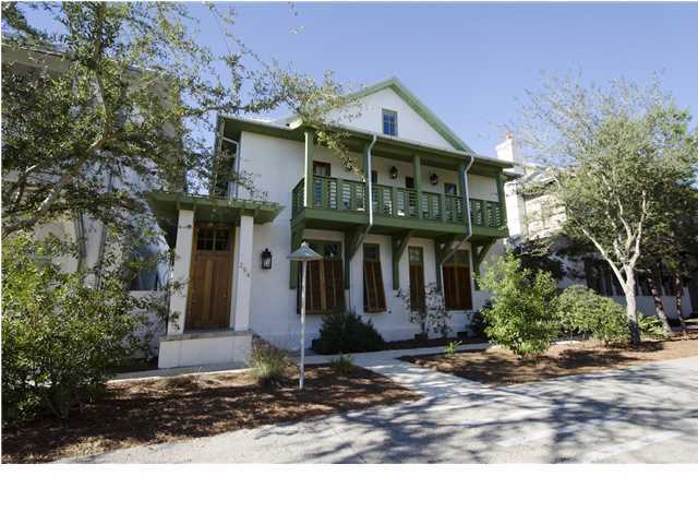 A stunning offering on the Park Side in Rosemary Beach! The owner has used the home less than 100 nights since it's completion in 2009 and it has never been on a rental program. The enormous COURTYARD situated between the main and carriage house offers a resort like atmosphere with an infinity hot tub flowing into the pool. The pool also features three waterfalls and a colored lighting package, all easily controlled by a floating pool remote. Rinse off after a long day at the beach in the enclosed outdoor shower. The MAIN HOUSE FEATURES high ceilings, exposed wood beams and gorgeous oak floors. Entertain friends in this open and bright gourmet kitchen that features top of the line GE Monogram appliances, honed granite countertops and tons of great storage. Throughout the home is an iPod