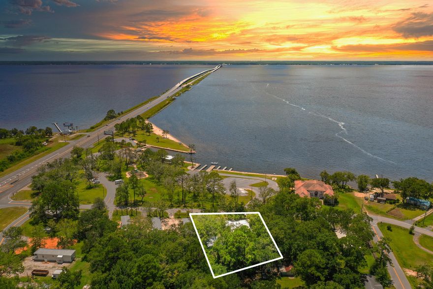 Water views from every room!!! Two LOTS!!! Completely renovated. All new Pella windows, Hurricane clips., Metal Roofs on home and garage just completed. New HVAC, New plumbing and electrical. Stainless steel appliances, tankless water heater. Property is Across from Walton County Grady Brown Park. includes:  Boat launching, fishing, kayak, beach on The Choctawhatchee Bay. Information deemed reliable but not guaranteed. To be verified by buyer.