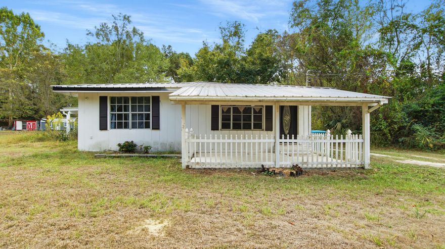 Cute 2BR bungalow located just outside of Florala! Home was updated in 2022 and 2023 and offers a great size living room, a large open kitchen with gas stove, kitchen island, tons of cabinets and eat in area that overlooks the family room allowing family time while entertaining and also while cooking. Both BR offer large size rooms and could accommodate more than 1 child per room. The primary bathroom has all the things on your check list as well! Home also includes a covered side porch with wood burning fireplace that is great for morning coffee or late-night relaxing. Home has tons of storage; yard includes 2 detached carports and workshop area and room for outside activities! Looking for your new home or an investment - new roof, new split units and plenty of space! Price is firm.
