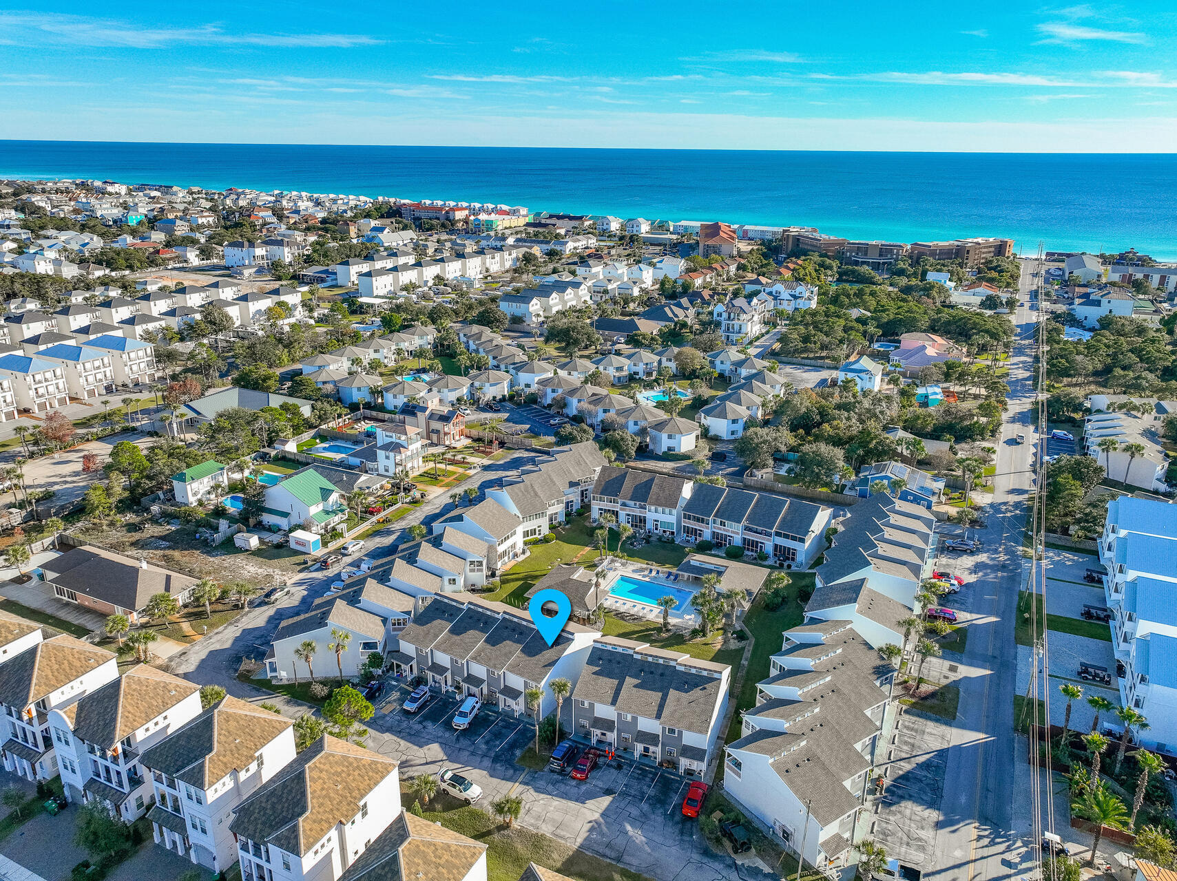 Experience coastal living in the charming Misty Cove townhome, perfect for full-time living, a second home, or a lucrative investment with $45,000 in rental potential. Just 1800 feet from Miramar Beach Regional Access and adjacent to Pompano Joe's Seafood Restaurant, enjoy free parking, restrooms, and wash stations. Revel in sun-kissed shores and a vibrant local scene, while the townhome boasts modern updates like granite countertops, stainless steel appliances, and chic white shaker cabinetry. New French doors lead to a screened-in patio with a tranquil pool view, enhancing the 2BR, 2.5BA space. Practical features include a full-size washer/dryer and fully-stocked beach gear storage: umbrellas, toys, chairs, grill - guest-ready! With an established VRBO listing & immediate rental income.