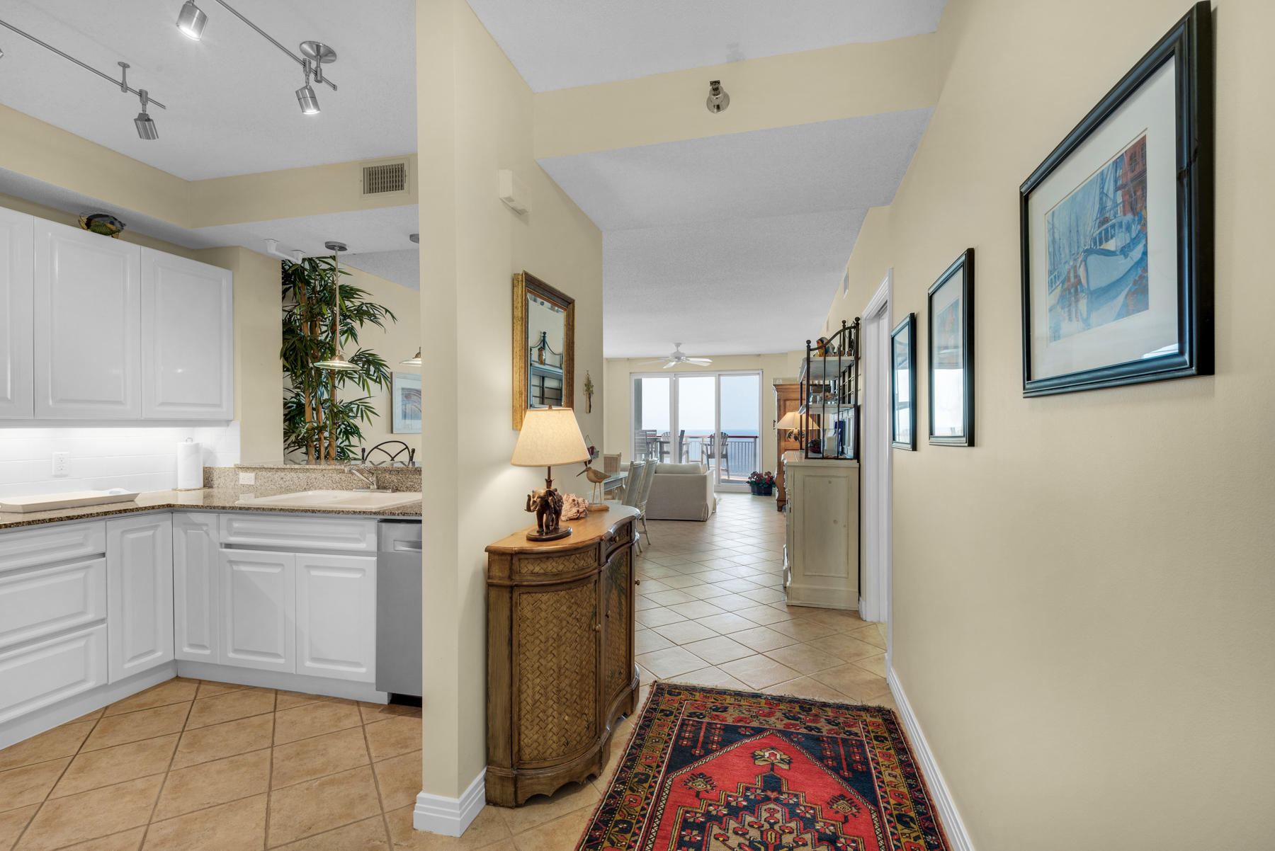 Simply the best! This 2 br/2ba 18th floor Penthouse has an unobstructed 25+ Mile beach view eastward to Destin & beyond. The unit is tastefully decorated with a contemporary flair and contains original artwork. The Seller is the original Owner and the unit has never been rented. Recent upgrades include: replacement of the water heater, the ice maker and the HVAC heat pump; installation of Bosch kitchen appliances including oven and dishwasher; installation of a large capacity LG washer & dryer. The living room sofa and kitchen sideboard are from ''DUH'' in Pensacola, and the Master bedroom has a Sleep Number bed. Amenities include swimming pool, owner's closet next to the front door, clay tennis courts, pickleball, shuffleboard, covered parking, fitness room, and social room with kitchen.