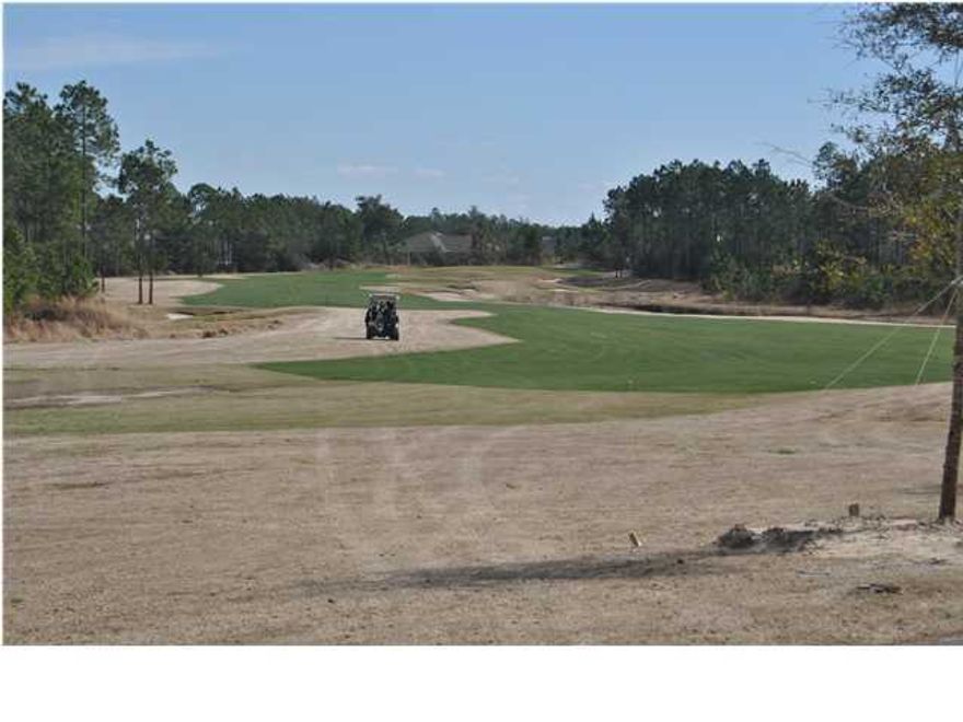 A great Golf Course lot on Windswept Dunes Golf Course. In Windswept Estates Gated Community one of the last of the big lot developments In northwest Florida. Overlooking the fairway on the hole #7. Please check out the pictures they will speak for this lot.
