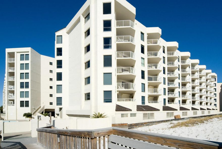 Rare opportunity to own the largest unit in Inlet Reef,one of Holiday Isle's premier gulf front properties. This unique floor plan offers sweeping views of the gulf and 2150 square feet of luxury living to accommodate your family and friends. The exquisite dining and living room areas offer plenty of space for entertaining and relaxation. Large balcony has wet bar w/entry off of living room & master. Neutral large tile graces the main living areas and foyer. Kitchen and baths have been updated with granite counter tops. Custom built-ins,white Plantation Shutters & crown molding add a definitive contemporary style to the decor. Unit presents a great opportunity for investors offering lucrative short term rentals. Amenities include Tennis, pool,Sauna/Steam Room and of course the Beach!