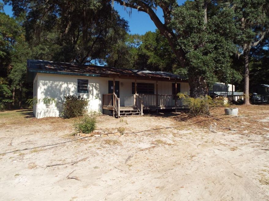 Two bedrooms, one full bath, tiled floors, partially fenced yard are some of what you will find here. There are enhancements needed to get this home move in ready. Take a look today, see what you can accomplish here.This property is bank owned. It is sold in as-is condition without repairs or warranty. Buyer is responsible for verifying all information contained in this listing.