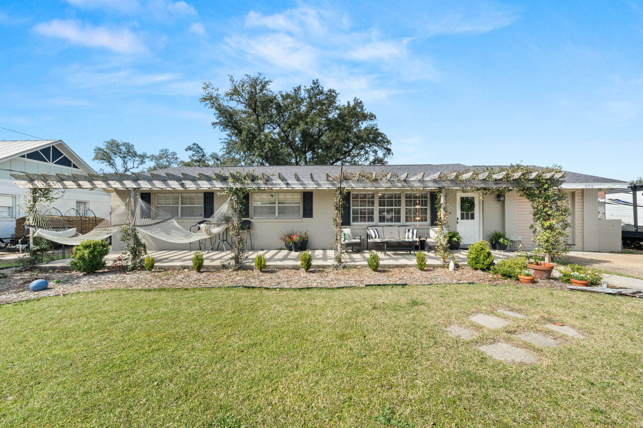 Welcome to this beautifully updated 4-bedroom, 2.5-bath home in Gulf Breeze Proper, just minutes from top-rated schools, pristine beaches, and premier dining. Thoughtfully upgraded, this home blends modern style with everyday functionality. The fully renovated kitchen is a chef's dream, featuring Wood Shaker cabinets, Taj Mahal Quartzite countertops, stainless steel appliances, a farmhouse sink, a custom vent hood, and a stunning marble backsplash. Designed for both efficiency and style, this space is perfect for everything from quick meals to hosting gatherings. The spacious living area flows seamlessly to a newly added bonus room, offering incredible versatility--ideal as a home office, gym, or play area for the kids. This room features brand-new LVP flooring, fresh paint, and all-new ductwork, ensuring comfort and durability. The adjacent enlarged laundry room provides ample space and extra storage for convenience. The primary suite is generously sized, while a hallway leads to three additional bedrooms, offering privacy and functionality. The updated bathrooms enhance the home's modern appeal, and the bright sunroom provides a serene space to unwind. Step outside to a spacious backyard designed for entertaining! Enjoy relaxing under the pergola, hosting barbecues, or letting kids and pets roam freely. A 15x20 shed in excellent condition offers additional storage for outdoor gear and tools. Major upgrades include: a new roof (home & shed), new HVAC system, and new water heater, providing peace of mind for years to come. Don't miss this rare opportunity to own a move-in ready home in one of Gulf Breeze's most sought-after locations! Schedule your showing today!