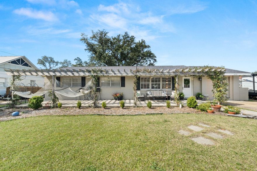 Welcome to this beautifully updated 4-bedroom, 2.5-bath home in Gulf Breeze Proper, just minutes from top-rated schools, pristine beaches, and premier dining. Thoughtfully upgraded, this home blends modern style with everyday functionality. The fully renovated kitchen is a chef's dream, featuring Wood Shaker cabinets, Taj Mahal Quartzite countertops, stainless steel appliances, a farmhouse sink, a custom vent hood, and a stunning marble backsplash. Designed for both efficiency and style, this space is perfect for everything from quick meals to hosting gatherings. The spacious living area flows seamlessly to a newly added bonus room, offering incredible versatility--ideal as a home office, gym, or play area for the kids. This room features brand-new LVP flooring, fresh paint, and all-new ductwork, ensuring comfort and durability. The adjacent enlarged laundry room provides ample space and extra storage for convenience. The primary suite is generously sized, while a hallway leads to three additional bedrooms, offering privacy and functionality. The updated bathrooms enhance the home's modern appeal, and the bright sunroom provides a serene space to unwind. Step outside to a spacious backyard designed for entertaining! Enjoy relaxing under the pergola, hosting barbecues, or letting kids and pets roam freely. A 15x20 shed in excellent condition offers additional storage for outdoor gear and tools. Major upgrades include: a new roof (home & shed), new HVAC system, and new water heater, providing peace of mind for years to come. Don't miss this rare opportunity to own a move-in ready home in one of Gulf Breeze's most sought-after locations! Schedule your showing today!