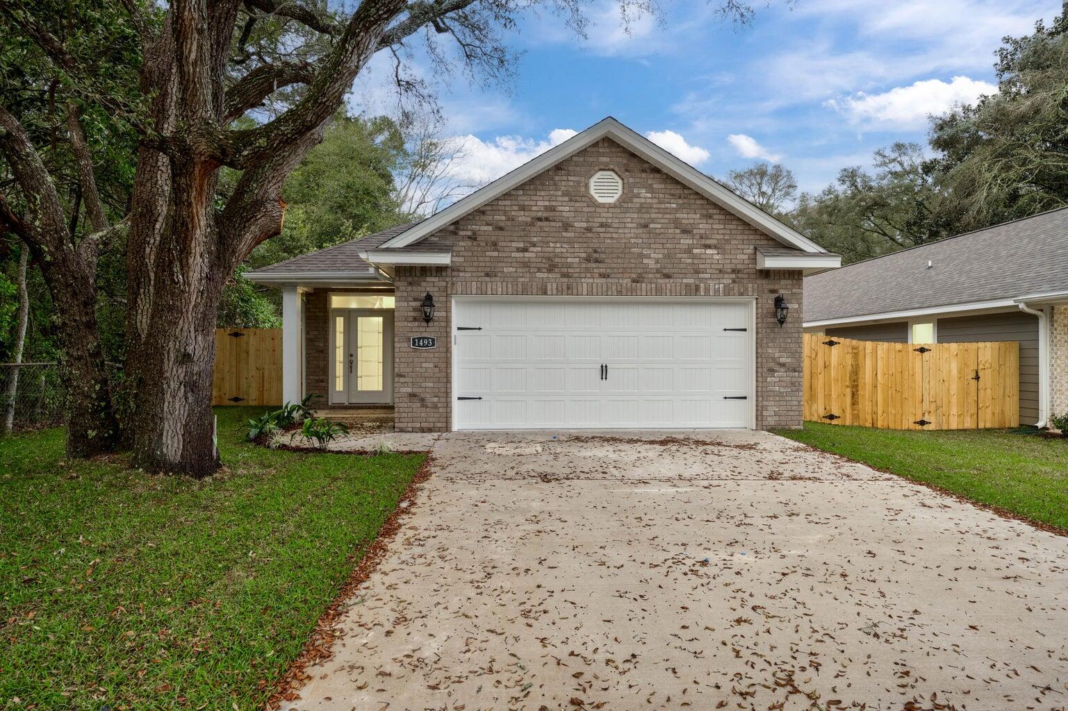 This 2024 built single-family home offers the perfect blend of modern style and practical comfort. Featuring four spacious bedrooms and two-and-a-half bathrooms, the home showcases an open-concept living and dining area with stunning wood-look tile flooring and an abundance of natural light from oversized windows. The kitchen is a standout, boasting stainless steel appliances, granite countertops, and fresh, white cabinetry that gives the space a clean and contemporary feel. A convenient powder room and a dedicated laundry room add to the home's functionality. The split floor plan ensures privacy, with a carpeted master suite that includes a large walk-in closet, dual vanity, a generous walk-in shower, and a separate water closet. Guest bedrooms are spacious and feature upgraded carpeting while the guest bathroom offers a large vanity and a shower-tub combo. Ceiling fans are installed throughout for added comfort. Outside, enjoy a very large, fully fenced backyard, perfect for entertaining or relaxing under the covered patio. Thoughtfully designed, this home checks every box! Contact us today for a private showing!!
