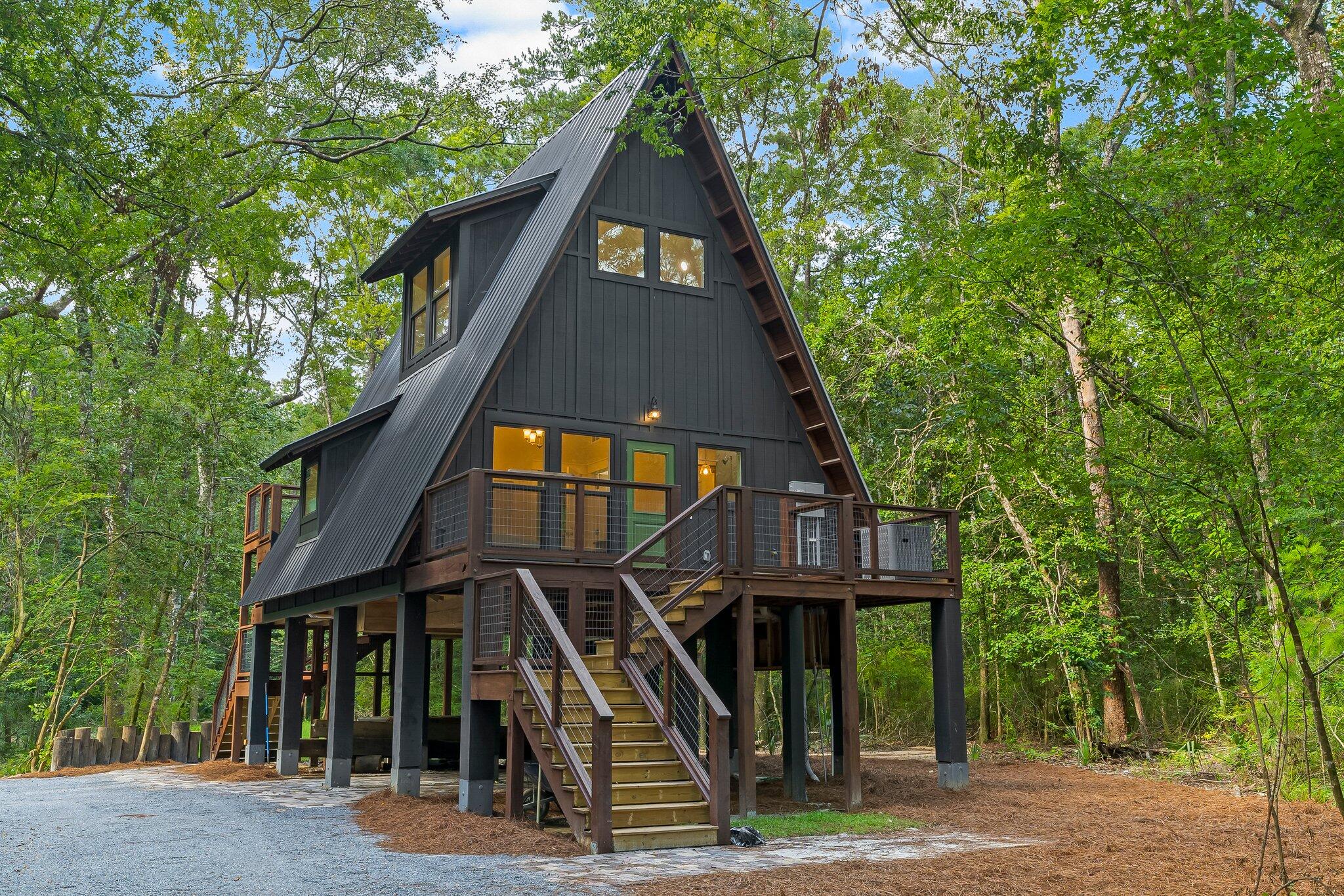 This stunning, brand new, tiny home is a modern farmhouse dream!! Located right on the Choctawhatchee River and in the woods, the privacy of your new home is a great escape from the busy, yet close enough to the beaches of South Walton and Panama City. Fully furnished, the main living area, kitchen and bathroom are on the second story with a large bedroom space on the third floor. Decks on both sides of the home and plenty of covered storage under the home. This home looks like it should be featured in a magazine with the attention to details and finishings selected.***Loft access is by ladder or outside stairs A Rental Application Fee of $70 for each applicant will be collected to initiate a screening and criminal background check as part of the application evaluation process. Beach Sunsets Inc charges a Resident fee of $25 per month payable with rent. This charge is designed to provide convenience and professional service to each tenant(s). Pet Security Deposits are $500 PER PET and refundable if there is no damage at lease end. Pet Rent is $25 PER PET per month. At lease execution, security deposit(s), pet security deposit(s), and any lease required prepaid rent are due and payable. Your first rent payment is made the day you move in and due the 1st to 5th of each month thereafter.
