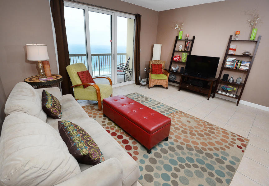 Incredible value for this turnkey 1BD/2BA at Seychelles! Close in time to capture high $ rental income. Quarterly HOA dues cover all utilities even power! This property has been meticulously maintained new HVAC 2/2017! Conveys fully furnished and rental ready. Tiled living area and stainless appliances. Let this condo be your next home away from home or performing investment property! This cozy 1 bed/2 bath condo accommodates six people with a king in the master bedroom, built-in hallway bunks, and a sofa sleeper. Located in very desirable area of Thomas Dr. next to popular restaurant Schooners and less than one mile from St. Andrews State Park one of the most beautiful and popular state parks in the state! This Gulf front building has lush, tropical landscaping.
