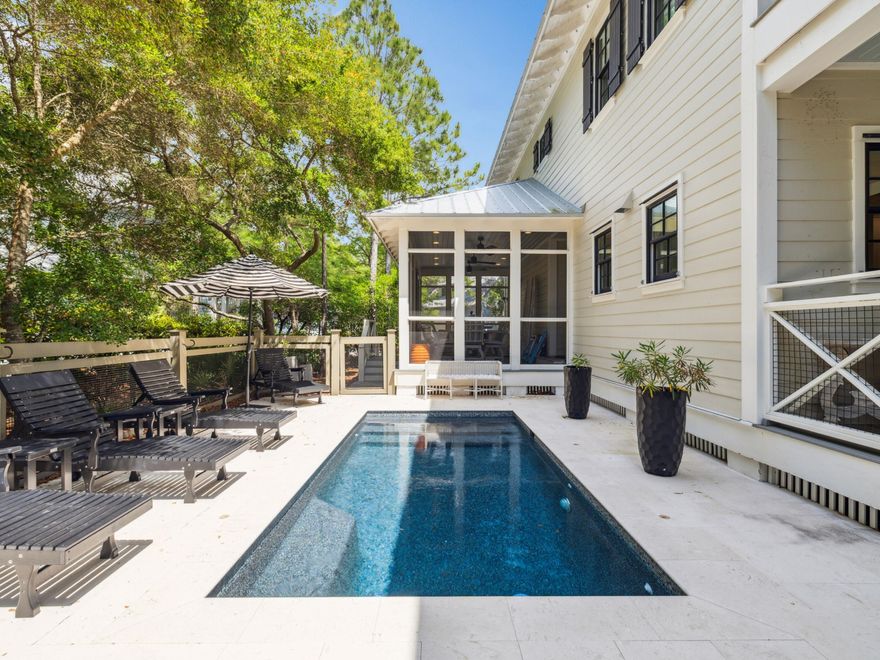 Tucked away in the highly coveted Camp District of WaterColor, this newly renovated coastal retreat masterfully combines timeless luxury with laid-back Florida charm. Offering over 3,100 square feet of impeccably maintained living space, the 4-bedroom, 4.5-bathroom home is just a short stroll from Camp WaterColor's award-winning amenities.Step outside to your private oasis, where a brand-new heated saltwater pool with a tranquil water feature, LED lighting, and travertine surround invites effortless relaxation. Finished with premium Gunite for a sleek, refined look, the outdoor living experience is further elevated by a large screened porch--perfect for alfresco dining--and lush, professionally enhanced landscaping that provides privacy and curb appeal. Included in the sale is a brand-new golf cart featuring LED lights and a premium sound system, making trips to the beach or town both stylish and convenient.

Inside, the home is bright and welcoming, with white oak ceilings, a thoughtfully updated interior, and refined finishes throughout. The chef's kitchen is a true showpiece, complete with Wolf, Sub-Zero, and Bosch appliances, marble countertops and backsplash, and a dedicated ice makertailored for effortless entertaining. Each bedroom is beautifully appointed, with upgraded televisions and a brand-new mattress in the primary suite. New furnishings inside and out ensure a completely turn-key experience.

Whether you're searching for a full-time residence or a luxurious second home, this WaterColor gem offers a rare opportunity to own a move-in-ready retreat just minutes from the Gulf, Seaside, and all the best of 30A.