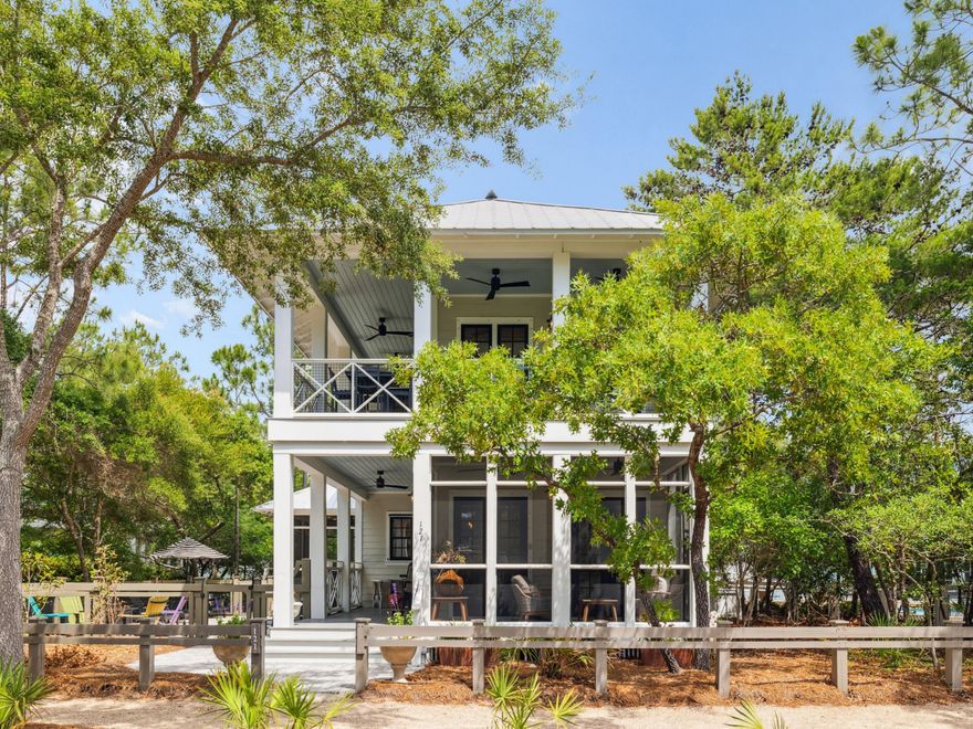 Tucked in the highly desirable Camp District of WaterColor, this newly renovated coastal retreat blends sophisticated design with effortless Florida living. Impeccably maintained and thoughtfully updated, the four-bedroom, four-and-a-half-bath home offers over 3,100 square feet of light-filled living space just steps from Camp WaterColor's premier amenities. Anchored by a brand-new heated saltwater pool with a tranquil water feature, LED lighting, and travertine decking, the outdoor living area is a true private oasis. The pool was finished with premium-grade gunite for a sleek and durable finish. A new golf cartequipped with LED lighting and a premium sound systemis also included, offering easy access to the beach, shops, and scenic 30A.

Inside, an open-concept floor plan showcases white oak ceilings, designer lighting, and freshly updated bathrooms throughout. The chef's kitchen is equipped with Sub-Zero, Wolf, and Bosch appliances, marble countertops and backsplash, and a dedicated ice makerideal for entertaining. A large screened porch off the living area creates a seamless transition to outdoor dining and relaxation.

Newly furnished throughout, the home includes upgraded TVs in every bedroom and a brand-new mattress in the primary suite. Set on a beautifully landscaped lot with mature trees and curated greenery, the property offers both privacy and curb appeal.

Whether you're searching for a full-time residence or an investment-ready vacation home, this WaterColor gem delivers turnkey luxury just minutes from the Gulf, Seaside, and everything 30A has to offer.