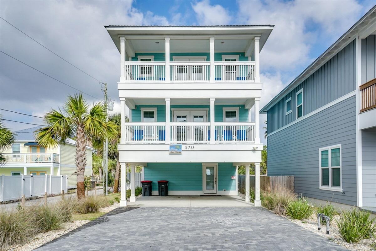 UNDER CONTRACT. SELLER ACCEPTING BACK UP OFFERS. ''JUST BEACHY'' is the perfect answer for Beach Lovers! Location...location....This one is directly across the street from the beach.... 20 STEPS To Sugar White Sand and Emerald Waters! This 7 bedroom with 6 full baths & 2 half baths, Large open living/dining/ kitchen area, game area, covered patio and PRIVATE HEATED POOL, offers generous space for family and friends to gather, relax and make great memories! Plenty of parking with both covered and open driveway parking. Fully furnished and ready