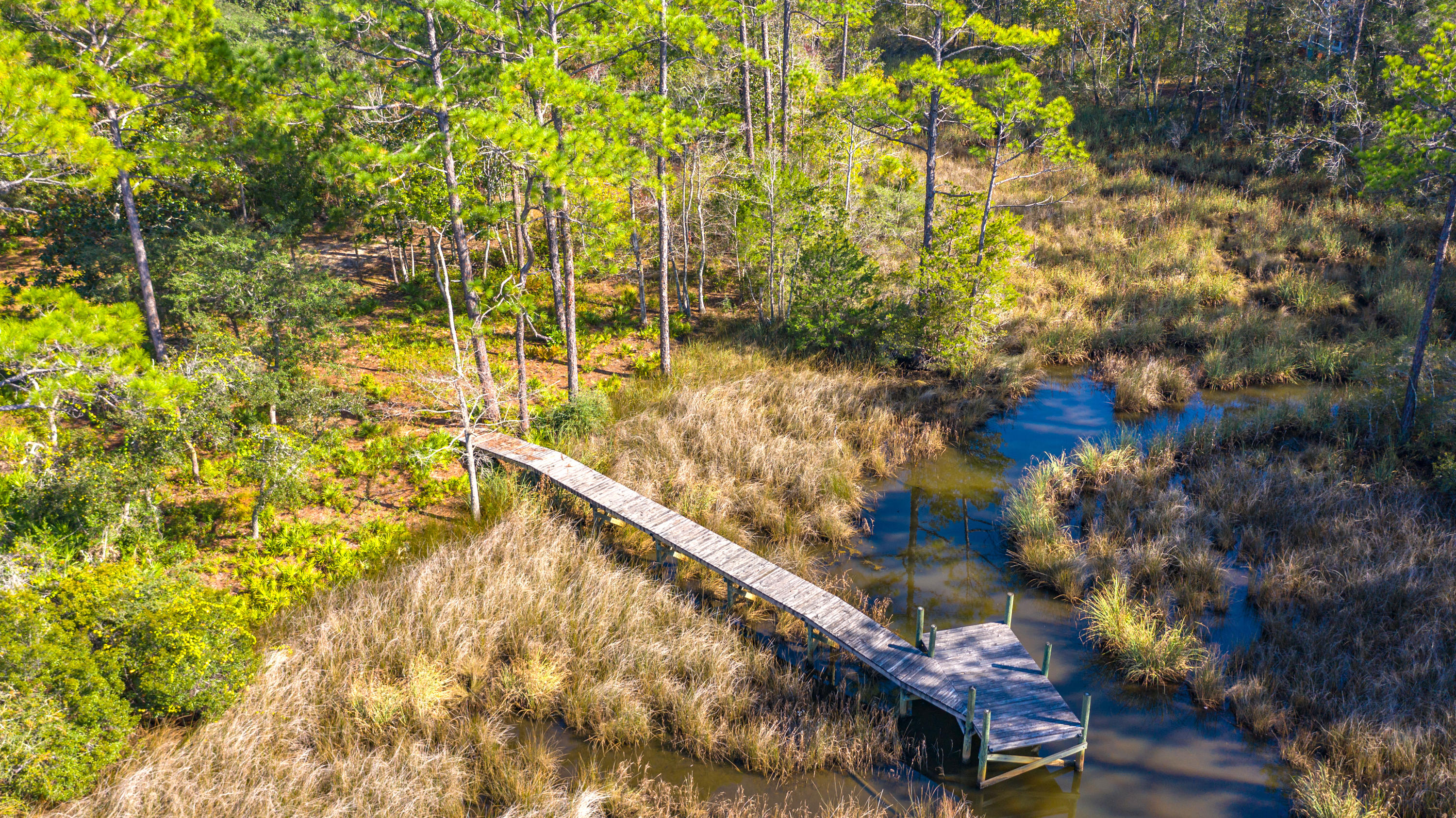Currently under contract with 72 hour first right of refusal. Lot 13 Bayou Circle is located on the end of one of the most desirable bayous in Freeport. Offering just over a quarter of an acre and covenants and restrictions have expired. Lot 13 features a pedestrian dock already in place (sold as-is) and as I understand it, deep enough for a boat dock if one was desired. Just a few miles across the 331 bridge to the Beaches of South Walton, yet far enough away to get away from the hustle and bustle of the tourist.
