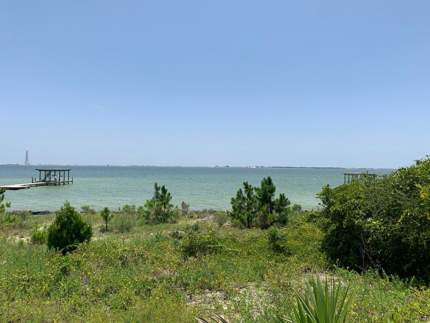BACK ON THE MARKET!! BUYER COULD NOT CLOSE!! AWESOME VALUE FOR A WATERFRONT LOT!! Incredible lot with 188 feet on Santa Rosa Sound and the Gulf Intracoastal Waterway! Spectacular views and sunsets on this protected body of water directly across from Santa Rosa Island and the Gulf of Mexico.Simply an outstanding location to build your home and boat dock. According to Okaloosa Growth Management, building footprint limited to approximately 165 X 31.6 X 165 X 42.8 which equates to 5,700+ square feet per story. Home height  limit is 45 feet which should easily allow for three floors.