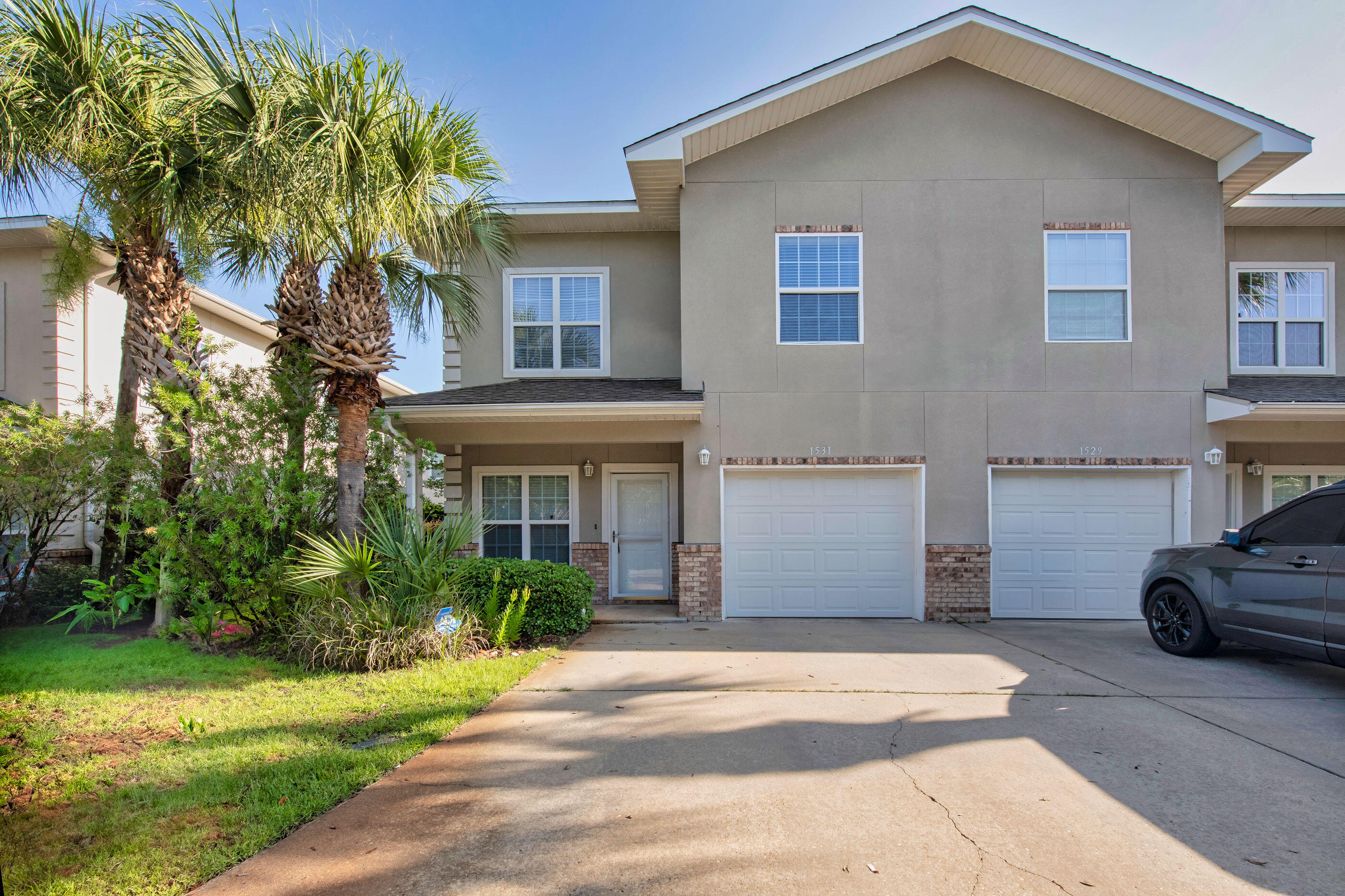 Priced to sell, this Fort Walton Beach townhouse checks all the right boxes! The carpets have been professionally stretched and cleaned, so they look and feel like new. Granite countertops add a stylish touch to the kitchen, and the layout offers plenty of flexibility; especially with the downstairs guest bath that can be kept private for the bedroom or shared with visitors. Upstairs, there's a spacious loft that's been used as a home office but could easily become a second living area, gaming space, or reading nook. The master suite features a large walk-in closet and a dual vanity in the bathroom. With lawn care included in the HOA, you'll have one less thing to worry about. Conveniently located near everything Fort Walton Beach has to offer, this home makes everyday living easy.