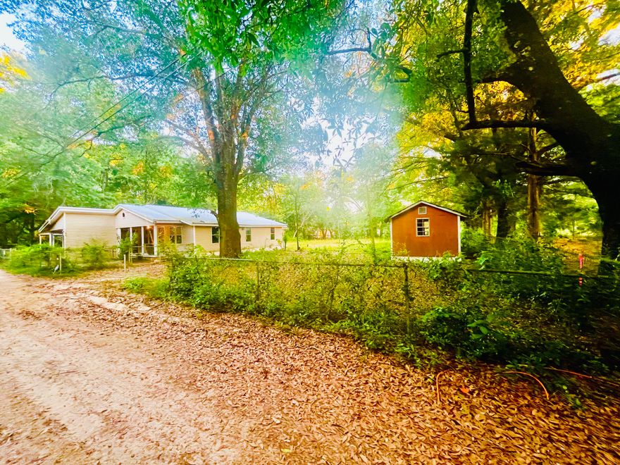 Investor Special or DIY Opportunity! This 2-bedroom, 1-bath home is located near Highway 90 and has been fully stripped down to the studs--offering a clean slate for your next project. Whether you're an investor looking for your next flip or a homeowner ready to customize every detail, this property provides the ideal foundation. Situated on approximately half an acre, there's plenty of room to create the layout and features that fit your vision. Property is being sold as-is and is ready for renovation. Zoned for commercial use, adding potential for future development or business use (buyer to verify zoning and usage with the county). Don't miss this opportunity!