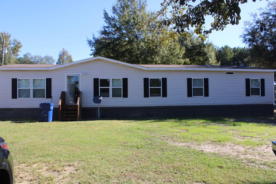 Welcome to this charming country home conveniently located along Highway 55, offering the perfect blend of comfort, space, and small-town living. Set on a generous lot, this property provides plenty of room to enjoy the outdoors while remaining just minutes fromdowntown Florala and the Florida state line. The home features a functional layout designed for everyday living, with a cozy living area,a practical kitchen, and comfortable bedrooms. Outside, you'll find ample space for gardening, recreation, or adding a workshop orstorage building. Whether you're looking for a starter home, a peaceful retirement retreat, or an investment opportunity, this propertyoffers great potential in a desirable location. Enjoy quiet country living with the convenience of nearby shops, schools, and amenities.Schedule your private showing today