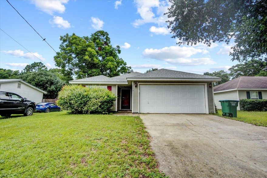 Charming 3-bedroom 2-bathroom home nestled right in the heart of Crestview on two lots, ready for you to make it home! A new roof was installed 3 years ago. The home features a spacious living area, with a wonderful galley style kitchen with tile in the kitchen, dining, laundry, and baths, with carpet in the master and guest room. A new hurricane sliding backdoor was installed in 2020. The backyard is large enough for a pool, swing set, trampoline, or even a she-shed!