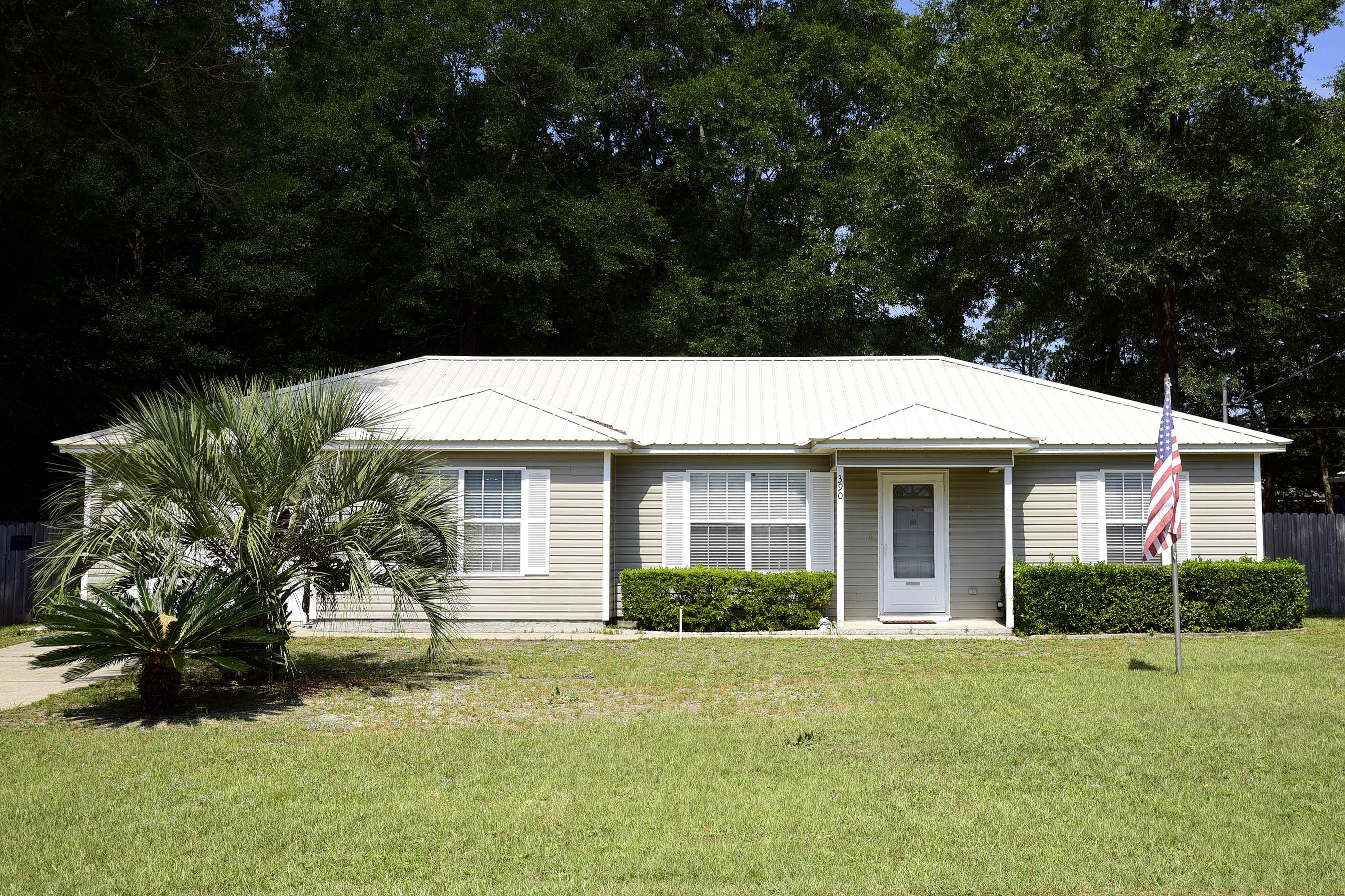 AMAZING OPPORTUNITY to own an impeccable home at an affordable price, in the heart of the blooming city of Crestview, FL. Conveniently located - Just minutes away from Duke Field, 77th Special Forces, Eglin AFB, and medical facilities. At walking distance to elementary, middle and high school, 24 acres of recreational Twin Hills Park; NWF State College Robert L. F. Sikes Education Home Center, Troy University, Emerald Coast Aviation, and restaurants. This pride of ownership is equipped with NEW METAL ROOF in 2019, new Low Boy 50 Gal water heater in 2016. A/C replaced in 2015, new refrigerator in 2017. Nicely maintained lawn - w/sprinkler system. Split bedrooms, walking closet in master bedroom. Kitchenhas plenty of counter space, with working desk, and opens up to dining and
