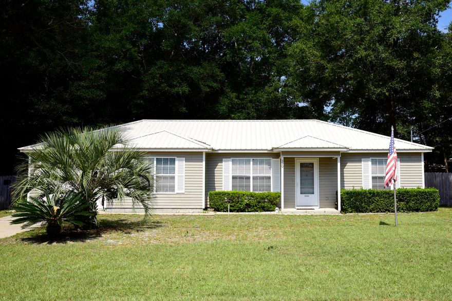 AMAZING OPPORTUNITY to own an impeccable home at an affordable price, in the heart of the blooming city of Crestview, FL. Conveniently located - Just minutes away from Duke Field, 77th Special Forces, Eglin AFB, and medical facilities. At walking distance to elementary, middle and high school, 24 acres of recreational Twin Hills Park; NWF State College Robert L. F. Sikes Education Home Center, Troy University, Emerald Coast Aviation, and restaurants. This pride of ownership is equipped with NEW METAL ROOF in 2019, new Low Boy 50 Gal water heater in 2016. A/C replaced in 2015, new refrigerator in 2017. Nicely maintained lawn - w/sprinkler system. Split bedrooms, walking closet in master bedroom. Kitchenhas plenty of counter space, with working desk, and opens up to dining and