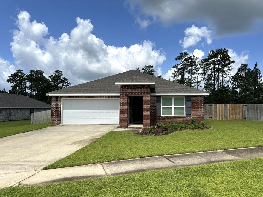 HERITAGE PLANTATION community offers underground utilities in a more rural, natural, wooded setting with LARGER homesites. The 'Cali' s one of our most popular designs. Beautiful kitchen features a lg. island bar for extra seating, stainless appliances, smooth top range, built-in microwave, quiet dishwasher & a desirable open design perfect for entertaining & everyday living. Beautiful wood look flooring throughout & PLUSH carpet in the bedrooms. Standard is fabric hurricane window and door protection, also the Smart Home 'Connect' System with a video camera doorbell/keyless entry and more. Large homesites in this unique community with a very impressive entrance. Only about 10 min. to the Publix store on Airport and Hwy 85. Community Pool included with lease