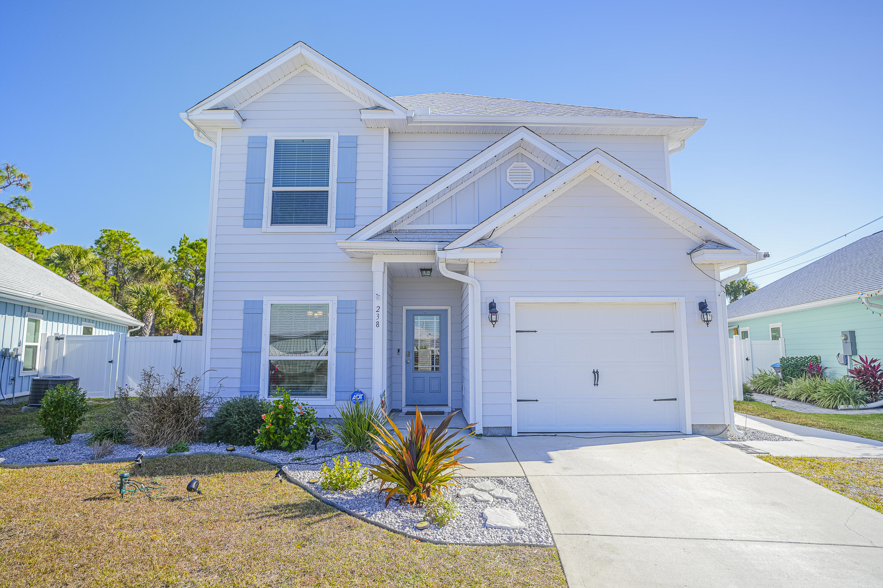 Step into this lovely 2-story, 4-bedroom, 3.5-bathroom home with an attached garage, located in the highly desirable Moonraker community. Just blocks from public beach access and across the street from Shipwreck Island Water Park, this home is also centrally located in Panama City Beach, with shopping and dining nearby, including Publix just 1.2 miles away. Inside, you'll find 9' ceilings and LVP flooring throughout the common areas, with plush carpeting in the bedrooms and upstairs hallway. One of the standout features of this home is the secondary living space upstairs, along with larger-than-usual bedrooms that provide ample space and privacy for everyone, as well as the Master Bedroom on the first floor of the home. Outside features a spacious back porch and yard.