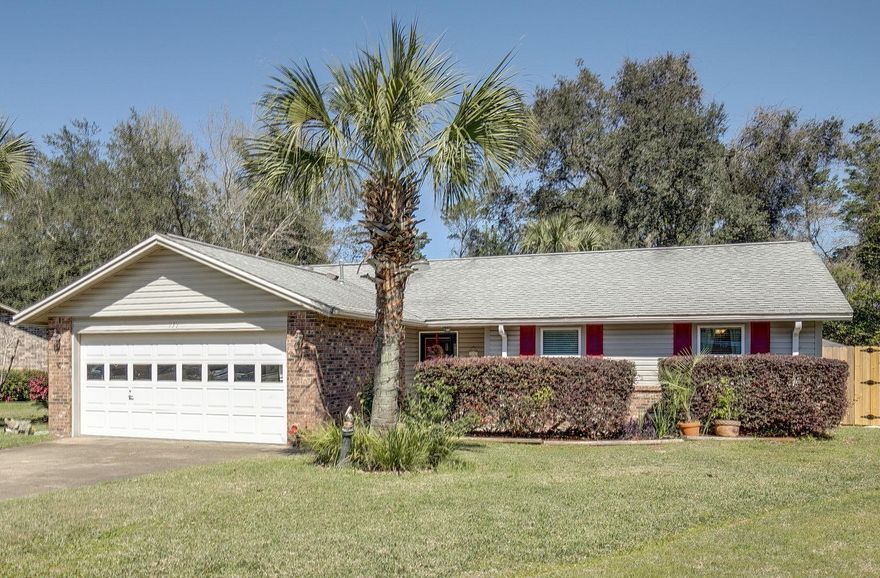 Paradise in the heart of Bluewater Bay. This home on a cul-de-sac has everything you need. With an open kitchen & family room area, everyone can gather together for special times. Living room has wood burning fireplace with option of converting to gas. Newer kitchen features, gas stove and all stainless steel appliances. Newer laminate & tile floors throughout with updates to plumbing and electrical. Plenty of living spaces for everyone to enjoy with a dining room, den, and Florida room which has been converted to have central heat/a-c. Relax in your private front patio nook or enjoy entertaining on your over-sized deck overlooking your spacious privacy-fenced backyard. From azalea bushes to camellias, from orange trees to magnolias, this yard is