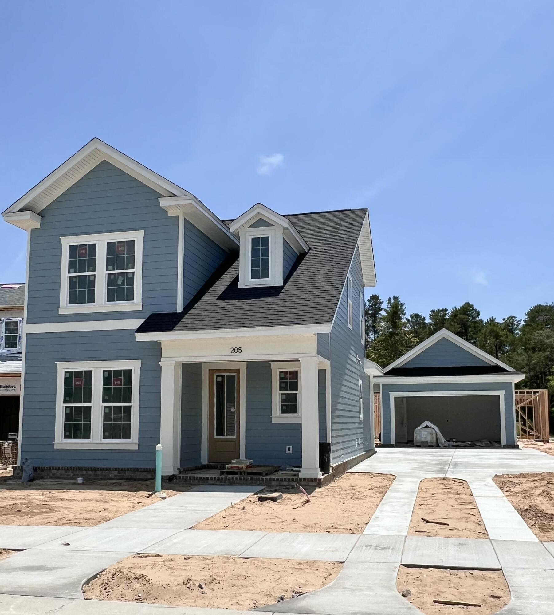 Welcome to Deer Moss Creek's newest neighborhood, Brookfield at Deer Moss Creek Phase 7A!! This neighborhood is strategically planned with each home being built to perfectly suit the lot. The Jasmine Plan, will have 4 bedrooms, 2.5 baths and a 2 car garage. This 2-story home has a large family room leading to the dining area and kitchen. The kitchen's crisp white shaker cabinets, quartz countertops, apron sink, stainless appliances, gas range and the large kitchen island give a clean, modern feel to a home with timeless charm. The primary suite is located on the main floor, featuring a white melamine custom-tailored shelved walk-in closet.Three additional bedrooms and one full bathroom are located on the second floor. LVP flooring runs throughout the home with tile in the wet areas. As part of the master-planned community of Deer Moss Creek, this home offers access to a wealth of amenities, including a community pool, clubhouse, basketball court, playground, gazebos, and scenic walking trails. Estimated completion June 2025