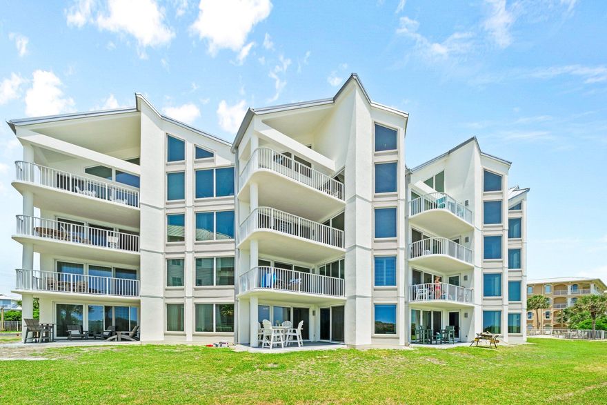 Welcome to Tranquillity on the Beach, a charming and intimate Gulf-front condominium community. This exceptional condo is ideally situated, offering stunning, unobstructed views of the Gulf with direct beach access right off your private patio -- no waiting for elevators to reach the sand, pool, or parking.Fully furnished and turn-key ready, the spacious floor plan features three bedrooms and three full bathrooms, including a Gulf-front master suite with balcony access. The gourmet kitchen is equipped with new appliances, beautiful granite countertops and a breakfast bar perfect for casual dining and gathering. The living room is bright and inviting, with large glass sliders that open to a covered balcony overlooking the meticulously landscaped grounds and the sparkling Gulf beyond
