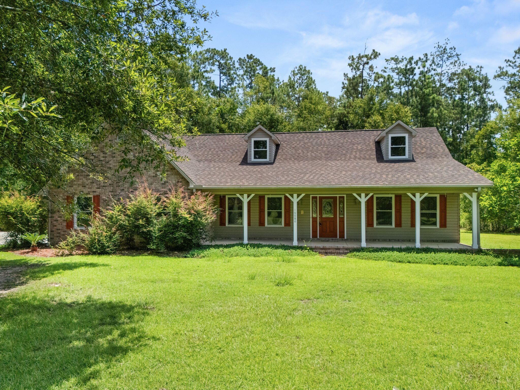 This is more than just a home--it's your private slice of Florida freedom. A Multi-Use Retreat on 10.3 Acres! Bring your horses, your RV, and your hobbies to this beautifully updated country escape just minutes from town. Nestled on 10.3 acres, this versatile property offers the space, amenities, and freedom to truly live your lifestyle--whether you're an equestrian, outdoorsman, or car enthusiast. The 3-bay workshop comes equipped with a car lift, perfect for mechanics or collectors. A spacious open pole barn with RV hookup offers added convenience for traveling guests or weekend getaways. With horses allowed and plenty of open land, it's ideal for riding, grazing, or simply enjoying peaceful rural living. Shooting and gun enthusiasts will appreciate the privacy and potential for a personal range. Step inside to find an inviting layout featuring a large formal dining room, a spacious living room, vaulted ceilings, and hardwood floors throughout. The heart of the home includes a cozy gas fireplace, quartz countertops, and a large laundry room with utility sink for added functionality. Recent upgrades like a new roof and newer HVAC system ensure comfort and peace of mind. There's also room to add a large pool, giving you even more space to relax or entertain outdoors. Utilities include public water, power, natural gas, and septic is a combination of rural independence and modern convenience. This is more than just a home it's your private slice of Florida freedom. Schedule your showing today and experience everything this private, multi-use property has to offer.