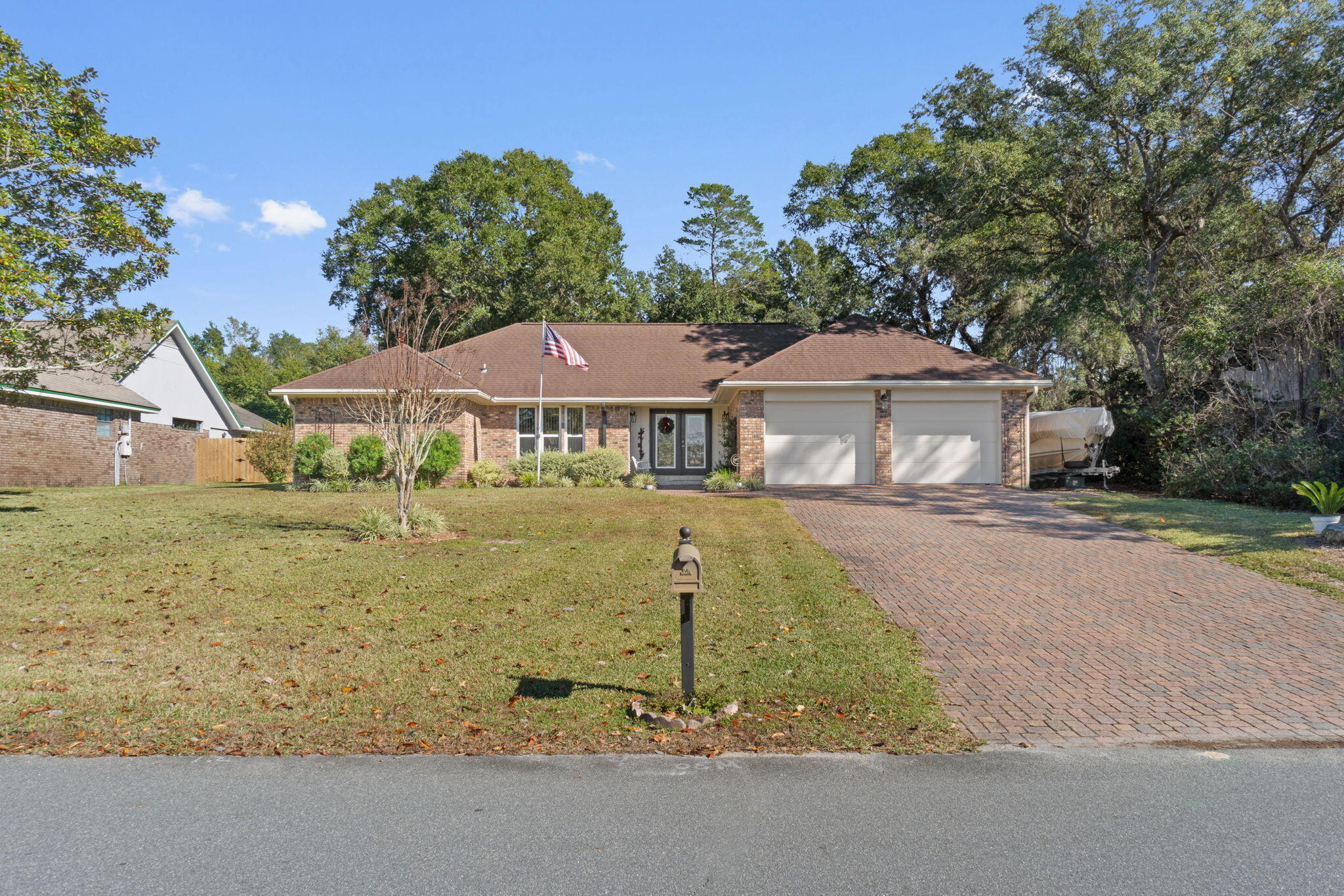 Awesome 3-bedroom 2 bath house in the heart of Bluewater Bay with a new roof being installed! Renovated kitchen with solid surface countertops, creamy white cabinets with pull-out drawers and a pull-out pantry, glass tile backsplash, under cabinet lighting and warm wooden ceiling beams. Tile floors flow throughout the home for easy maintenance. The master suite includes a sitting area and an updated bath with a state-of-the-art body shower system. Fabulous family room with vaulted ceiling and fireplace. The fenced in backyard also has a yard building complete with electricity. Other features of this home include: new HVAC system (2023), boat/RV parking,termite bond, solid wood doors, spray foam insulation in the attic, and pravered driveway & patio. Buyer to verify all information.