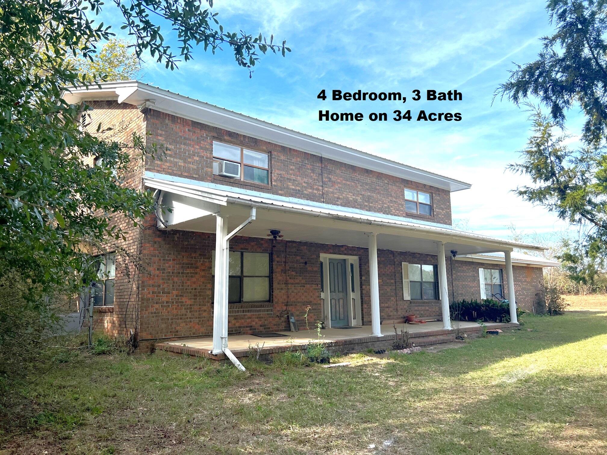 Great opportunity to bring this former farmstead back to it's former glory! The 3500 SF brick home features 4 BRs, 3 baths, with office and 20x28 game/rec room. Home is in need of TLC and updating but the potential is limitless! New metal roof was installed in 2019. Peel back the layers of time to reveal the fenced and cross-fenced former pastureland to include 4 pastures, holding pen, round pen and a 5 stall barn with tack room. Other features include a brick well house, and a large shop with covered parking for farm equipment located to the South of home. Per the plat, Ten Mile Creek runs through the SW corner of property. There is apx. 14 acres of pastureland, 3.5 ac of homestead and apx. 16.5 ac of woodlands, thick with pines oaks and magnolias. Schedule your appointment today