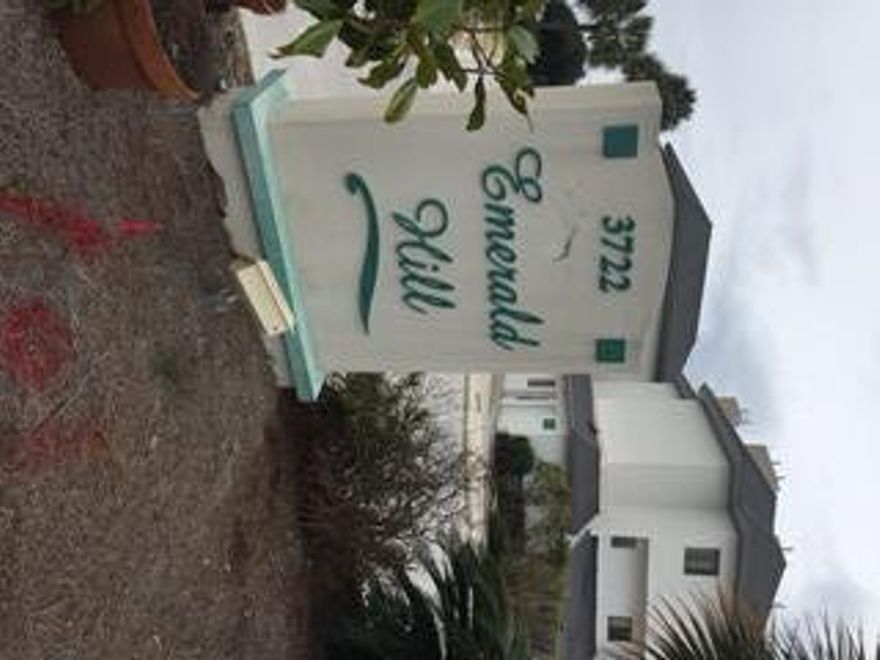 Emerald Hill is a 36 unit Gulf front complex in the heart of Seagrove Beach. This unit overlooks the pool with a slight view of the Gulf and only a few yards from the complex beach access. Nicely updated 2 bedroom 2 bath town home with one car garage. Within walking distance to several restaurants and shops. This is a vacation rental unit on Garrett Realty's website. KABA door lock belongs to the rental company and does not convey. Gross rental of $27,851 for 2015. This property qualifies for Buyer financing through Pen Federal Credit Union with lender paying up to $10k in Buyer's closing costs. Contact listing agent for more info.