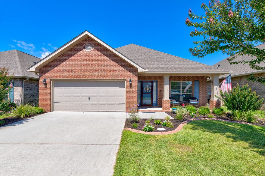 Beautiful 1 STORY home in the highly desirable subdivision of WATERFORD SOUND! Meticulously cared for since built in 2016, this 3BR/2BA/1,977 sq ft Bailey FE floor plan contains an office and countless upgrades! The sellers chose and paid extra for their PREMIUM LOT, expanding their covered front porch, adding the edged flower garden, putting vinyl floors throughout main areas and in both bathrooms, having a kitchen island, granite countertops put in the kitchen and both bathrooms, and choosing stone tiled flooring in the master shower. Even more upgrades were added afterwards to include gutters, blinds, and a sprinkler system. All stainless steel kitchen appliances, washer, dryer, and security system will convey. There is a transferable termite contract. HOA is only $290.40/year!