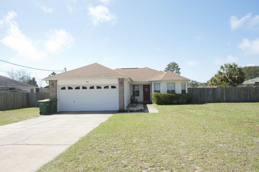 UPDATED home for sale in Navarre, FL. New flooring, lights and more! Country living but close enough to all your needs. Only 6 miles to the beach and 9 miles to Hurlburt Field AFB. Step inside and you will love the floors, vaulted ceilings and open floor plan. In the bright kitchen you will find new counters, breakfast bar, tile floors, plenty of cabinets and the stove and dishwasher were replaced in 2013. The kitchen and dining area are open to the living room and you can step out onto the screened porch and large deck. The large backyard is completely fenced with gutters, and sprinkler system. This .5 acre lot has plenty of room toys, boats, pool, etc. Back inside, there's a split bedroom floor plan, master bath and walk in closet. There's also a laundry/storage area. FREE home warranty