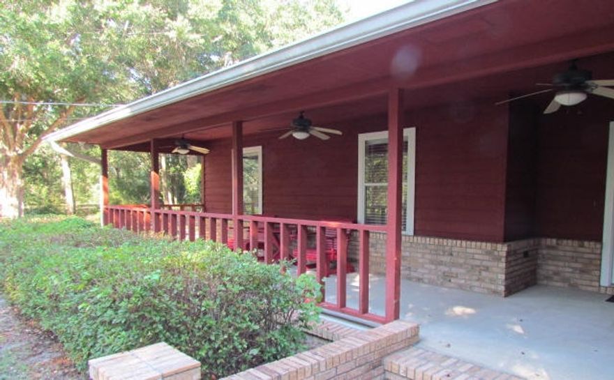 Ranch home located in desirable Indian Trails subdivision on 1 acre! Here is an opportunity to enjoy the private lakes and common recreation areas that the subdivision has to offer. This 3 bedroom, 2 and 1/2 bath has an open living floor plan where kitchen is open to dining room and living room. The kitchen is large with a lot of cabinets and work surface and breakfast bar. There is an office that looks out over park like back yard. The living room has cathedral ceiling with wooden beam and brick fireplace. There is a yard building in the back yard that matches the house. The garage has been converted with heat and air and adds extra square footage. This converted garage is also outfitted with a half bath. The bonus room leads out to the covered car porch that is extra large and is ideal