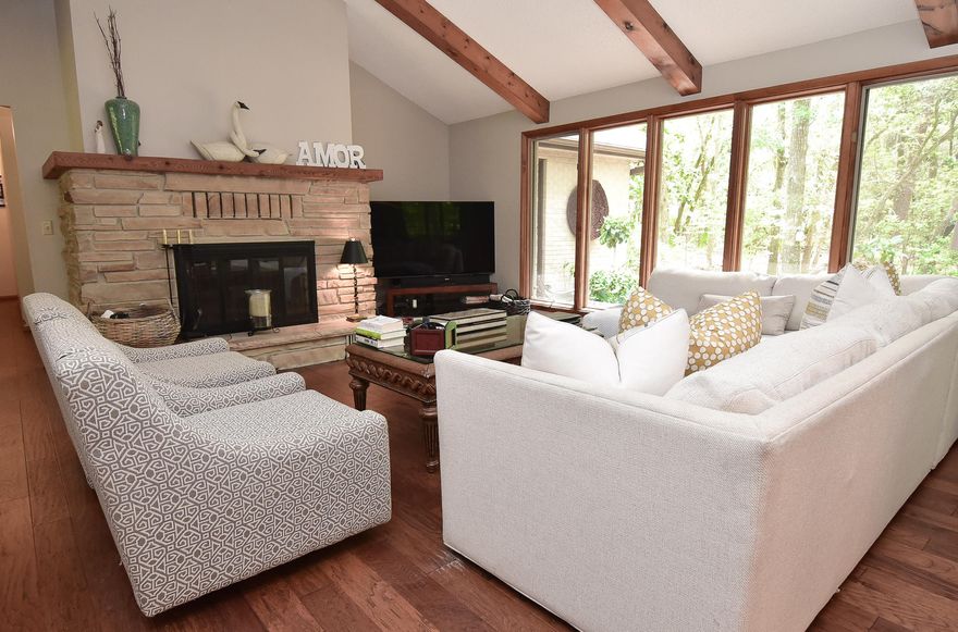 What a rare find! Nearly 3/4 of an acre in the heart of Niceville, on a beautiful wooded lot, in a gorgeous neighborhood and no HOA fees! The serenity of the home is unmatched; set in a picturesque portion of the woods, the openness of the house coupled with the natural beauty of the landscape makes the property a real sight to behold and a pleasure to live in. You literally relax the moment you walk in. The gleaming wood floors lead you in to the living room with the beamed and vaulted ceiling, straight out of Pinterest! Add in the open floor plan and the many windows, it is like living in your own treehouse in the middle of the city! The huge stone fireplace is a stunning focal point and the updated kitchen and dining room make it easy to entertain or just enjoy a family dinner. The laundry room will be the envy of your friends and then we come to the garage. Heated, cooled, extra deep and huge, the cars fit, the bikes fit...everything can go in here that doesn't go in the storage shed in the yard! It is currently used as a workroom, so your business is all set, especially since the cars can all sit outdoors in the large driveway. Yes, to the boat, yes to the RV. Plus, where do you put the pool? You have several choices! What are you waiting for? This one is will be gone soon. Please call to see it.