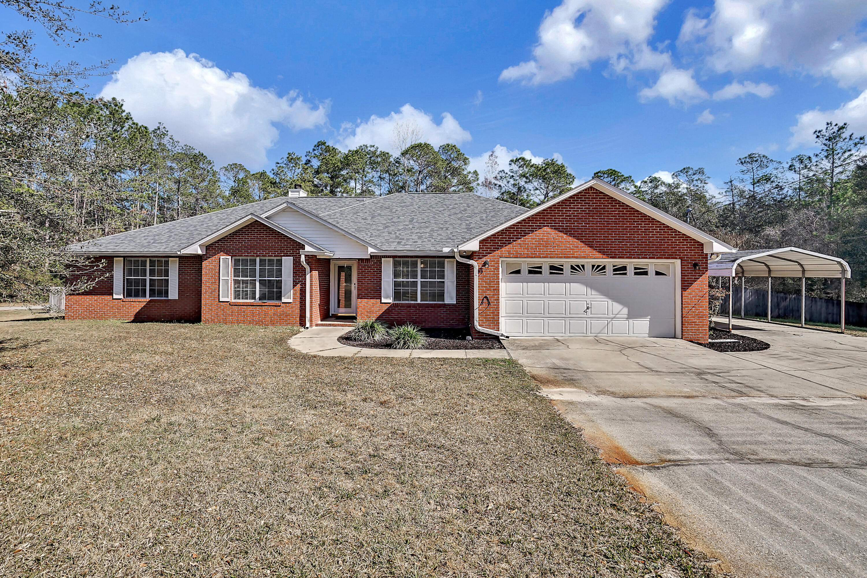 This beautiful, contemporary home is built to satisfy opulence living. Centrally located south of Crestview on a 1.18 acre lot, it's just minutes away from downtown, schools, shopping and less than a 30 minute commute to military bases Duke Field, Eglin and Hurlburt. Recently renovated, this 4 bedroom 3 bathroom home offers spacious living areas with LVP flooring, fresh paint, new fixtures, stainless steel appliances and spacious rooms. Outside of the living area you will find a screened in porch, large patio deck, a sizable fenced in backyard and a POOL! This home is a MUST SEE, so don't miss out on this opportunity and join us Saturday, January 29 for our open house!