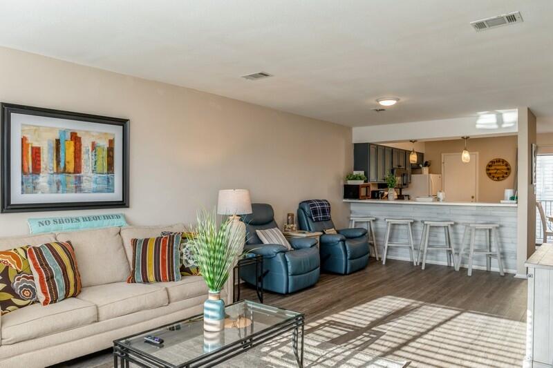 MULTIPLIE OFFERS. HIGHEST AND BEST due by 5:00 tomorrow. Located within close walking distance to the Gulf of Mexico, this newly remodeled two story condo with 2 bedrooms and 2 1/2 bath is ready for immediate occupancy. Complemented with two balconies (one off the master bedroom, and the other off the kitchen) this end unit has new LVP Flooring throughout, Remodeled Kitchen which opens out into the main living area. The dishwasher, disposal, hot water heater, toilets were changed in 2021. Sandprints amenities include a community pool, recreational room and BBQ pits. Sandprints is perfectly located near the best shopping, golf and some amazing restaurants. This won't last long. Buyer to verify all dimensions.