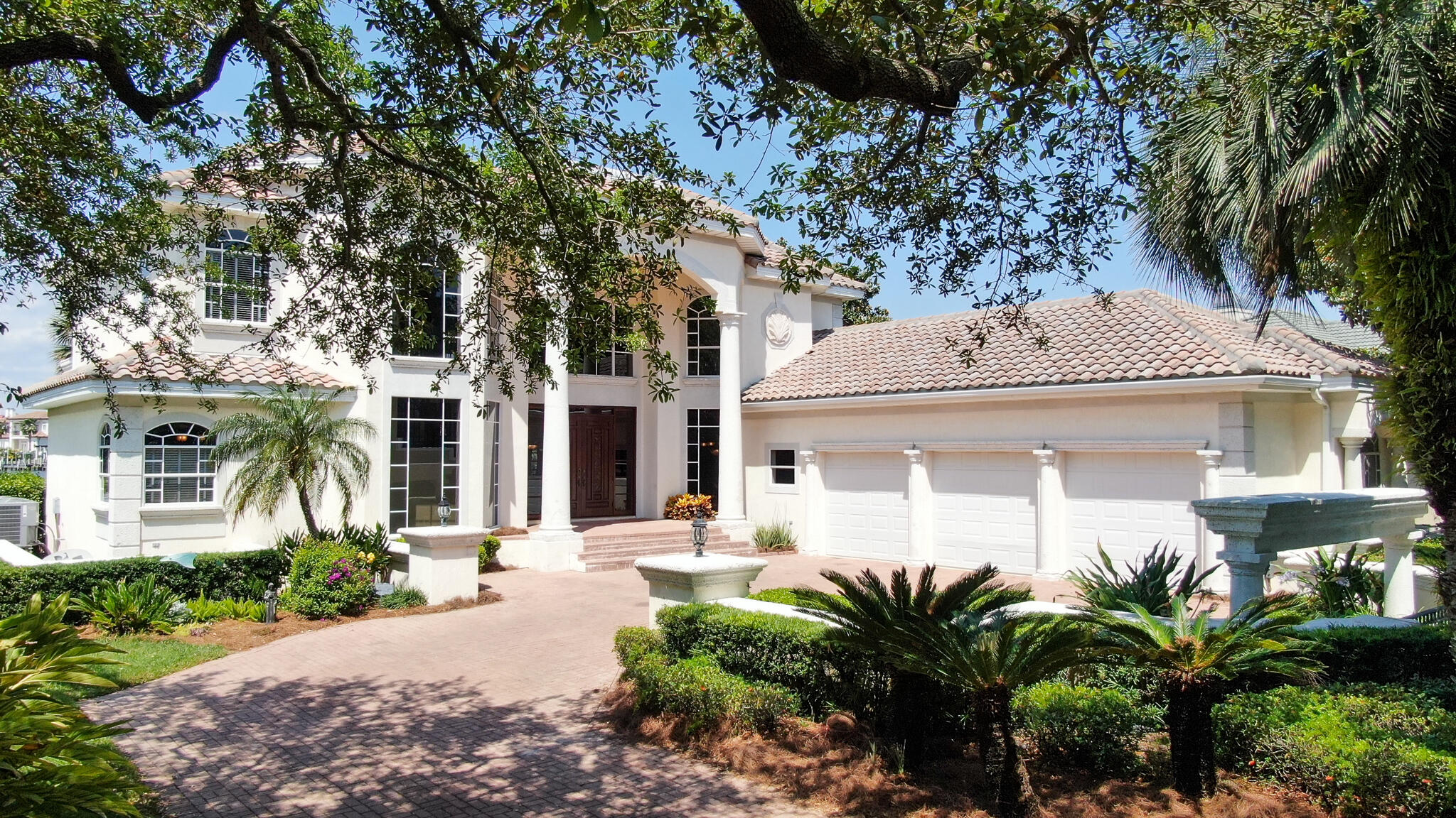 Your opportunity has arrived! ''Spectacular views'' simply doesn't do justice to this Jones Bayou waterfront home. Take advantage of the rare opportunity to own and enjoy the lifestyle that is waterfront living within the master-planned, gated community of Kelly Plantation. This custom built home was designed by Rick Brautigan out of south Florida and has exquisitely unique architectural accents and features throughout the estate. The attention to detail is evident from the grand entrance with a panoramic view of the bayou and bay the Tuscan style kitchen and breakfast nook. As you enter the vast openness of the living area, you will see the formal dining room to the right and the Master suite to the left.