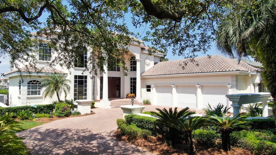 Your opportunity has arrived!  ''Spectacular views'' simply doesn't do justice to this Jones Bayou waterfront home.  Take advantage of the rare opportunity to own and enjoy the lifestyle that is waterfront living within the master-planned, gated community of Kelly Plantation.  This custom built home was designed by Rick Brautigan out of south Florida and has exquisitely unique architectural accents and features throughout the estate.  The attention to detail is evident from the grand entrance with a panoramic view of the bayou and bay  the Tuscan style kitchen and breakfast nook.  As you enter the vast openness of the living area, you will see the formal dining room to the right  and the Master suite to the left.