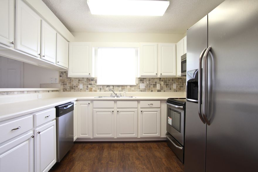 Back on the market. Wonderful and newly updated home located in the Shadow Lakes subdivision. Updates on the home include new: laminate hardwood flooring, stainless steel appliances, and the garage floor is being painted. Home offers three bedrooms, two full bathrooms, and a two-car garage. Exterior of the home includes privacy fencing, an open patio, and a spacious backyard. Buyer to verify room measurements.