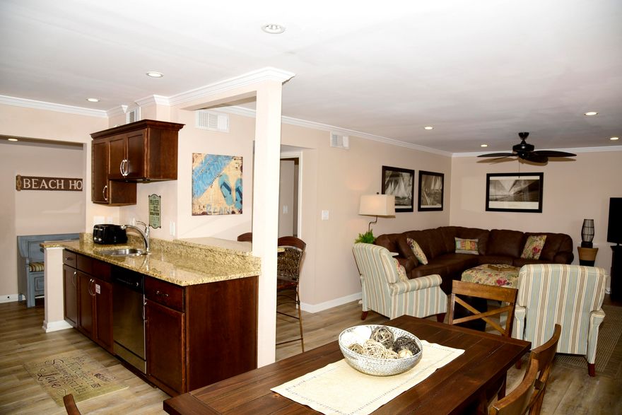 Beautifully updated and tastefully decorated 2 Bedroom/2 Bath fully furnished ground floor condo located on Seascape Golf Course. Seascape Resort is a 300+acre gated Golf and Beach Resort.  Amenities include pools, tennis and basketball courts, deeded beach access and much more.  The Seascape Towne Center offers restaurants, fun activities, and shopping.  The unit features spacious bedrooms, granite countertops, stainless steel appliances, and brand new flooring throughout.  This is an ideal 2nd home, investment property, or even full time residence.