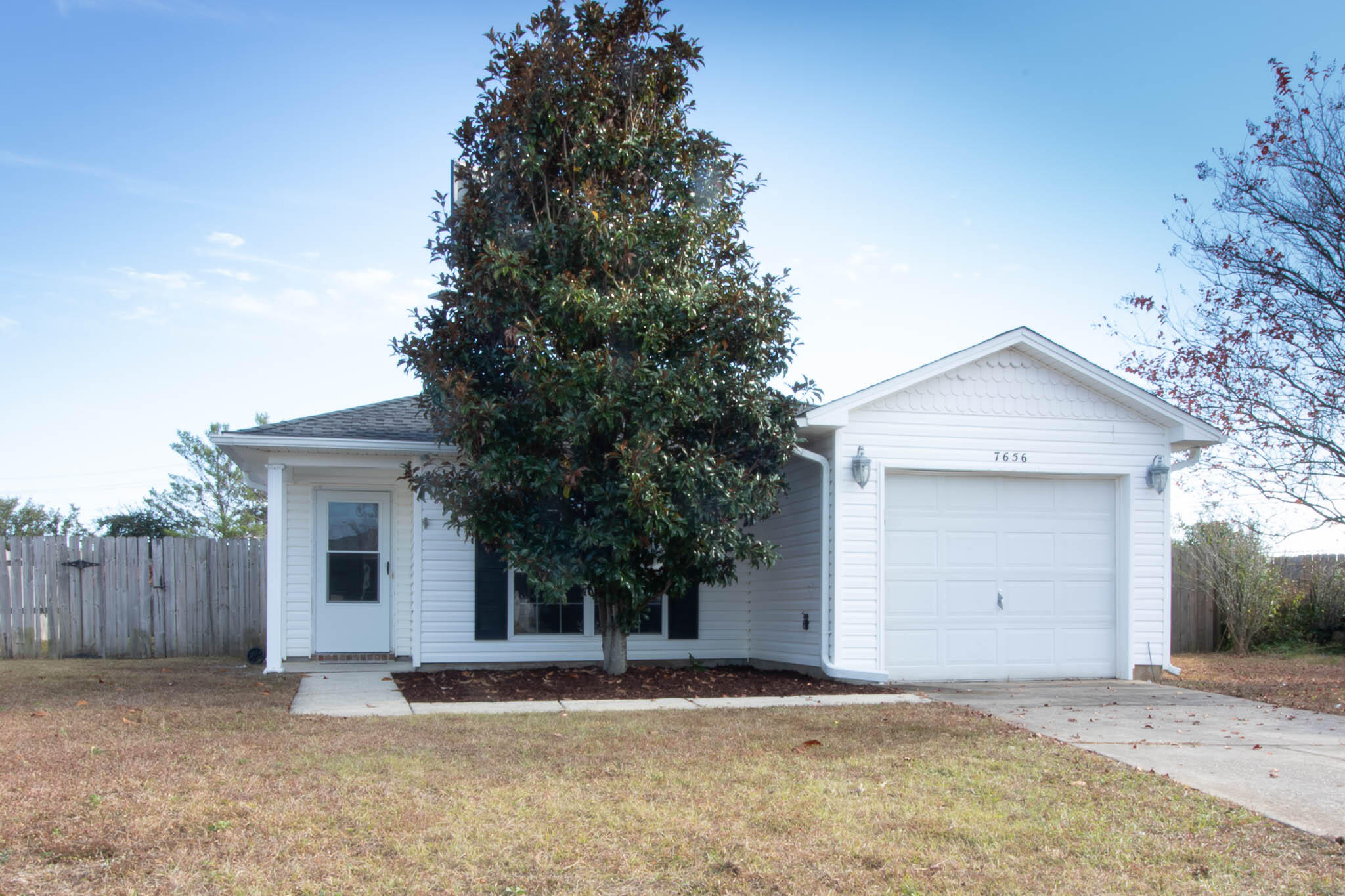 Looking for a 3 bedroom home, or an investment property in Navarre? Then this beautiful home with a newer roof will definitely check all the boxes for you. Upgraded flooring throughout, to include wood effect tile in the main living areas and primary bedroom suite, plus lifeproof carpet with a protective backer, in the additional bedrooms. The back yard is fully fenced, with an open patio area, ideal for entertaining. . Within easy reach of Highway 98 and Hurlburt Field, this property's location is perfect for commuters and military alike. Don't miss out on viewing your new home......call for an appointment today.