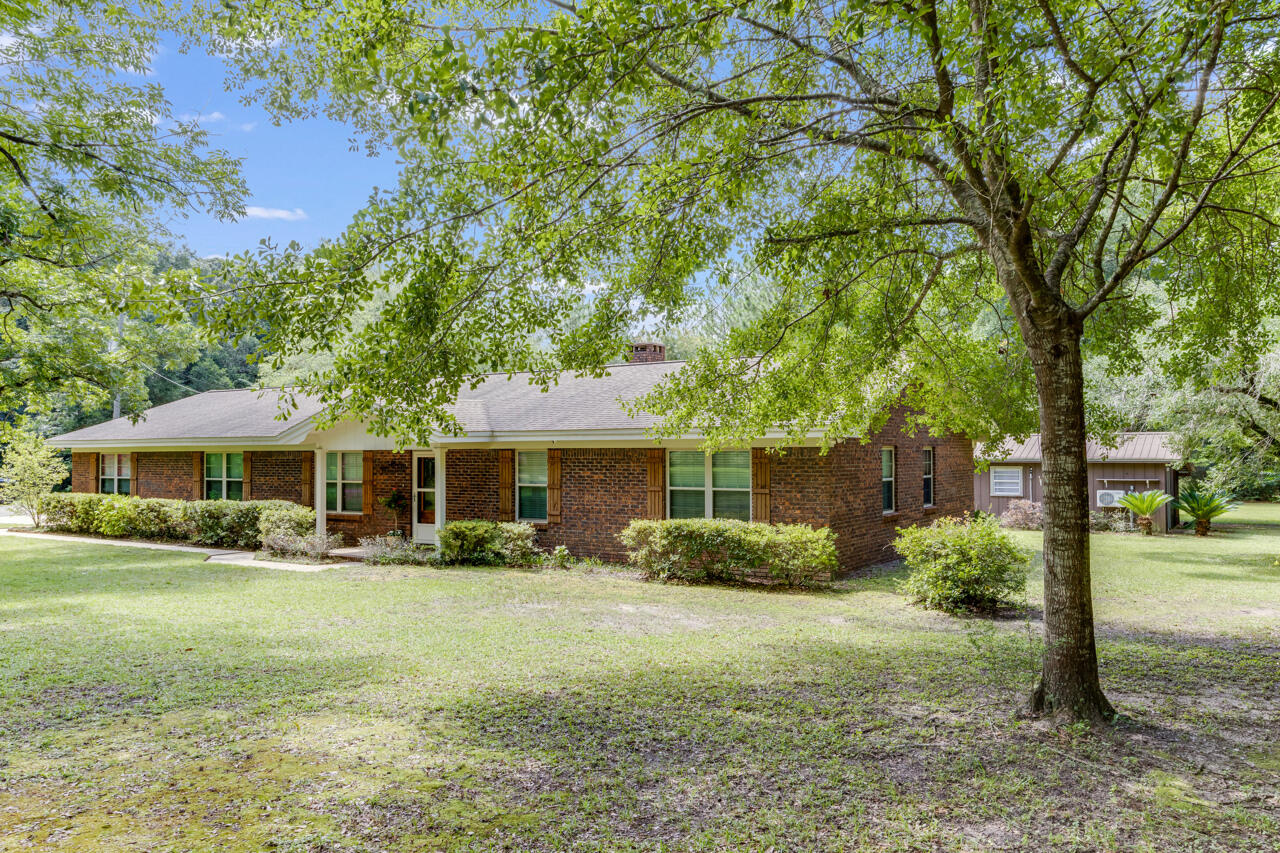Two parcels totaling 17.44 acres offer endless potential in a peaceful country setting. The 3.61-acre parcel features an open-concept home with LVP flooring, tile and carpet, a master suite with walk-in shower, mudroom, new porch with fans and speakers, a pole barn, and a separate creative space currently used as a salon. The 13.83-acre parcel includes a barn with previous horse stalls and loft, garage with office, and a RV hookup. Zoned timber and single-family, this property is ideal for equestrian use, homesteading, or a home-based business. Two parcels being sold as one. Functional systems in place. Space to live, work, and dream big!