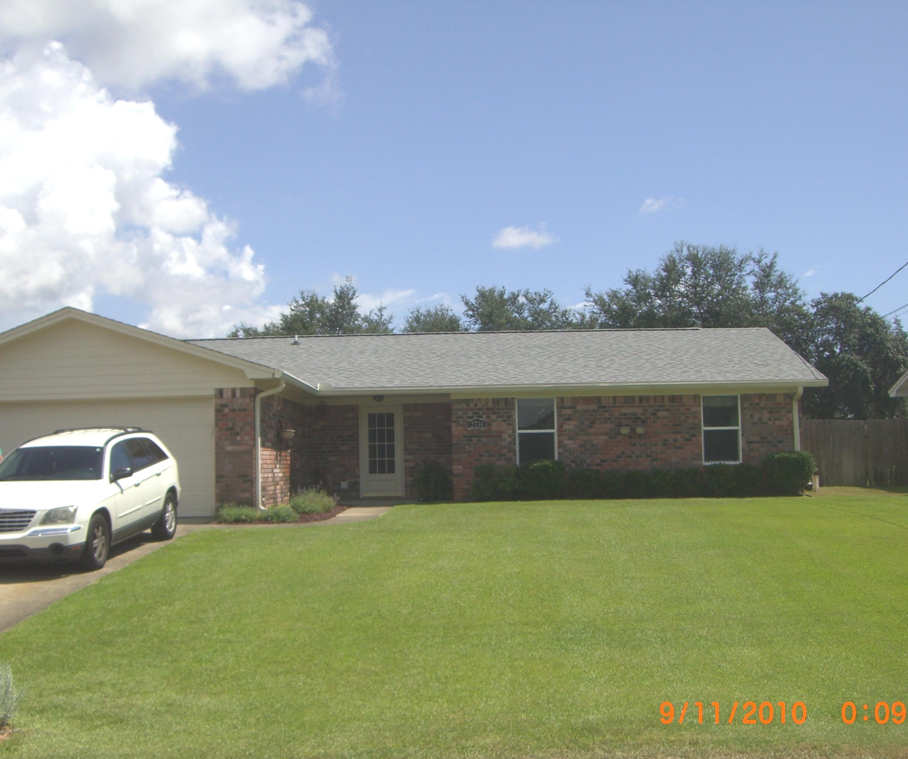 Al brick home, 15x20 screened patio that looks out to the large privacy fenced backyar. Large eat in kitchen with breakfast bar, lots of cabinets, tiled floors in the kitchen, hall and baths. Flat stove top and all brushed aluminum fixtures.