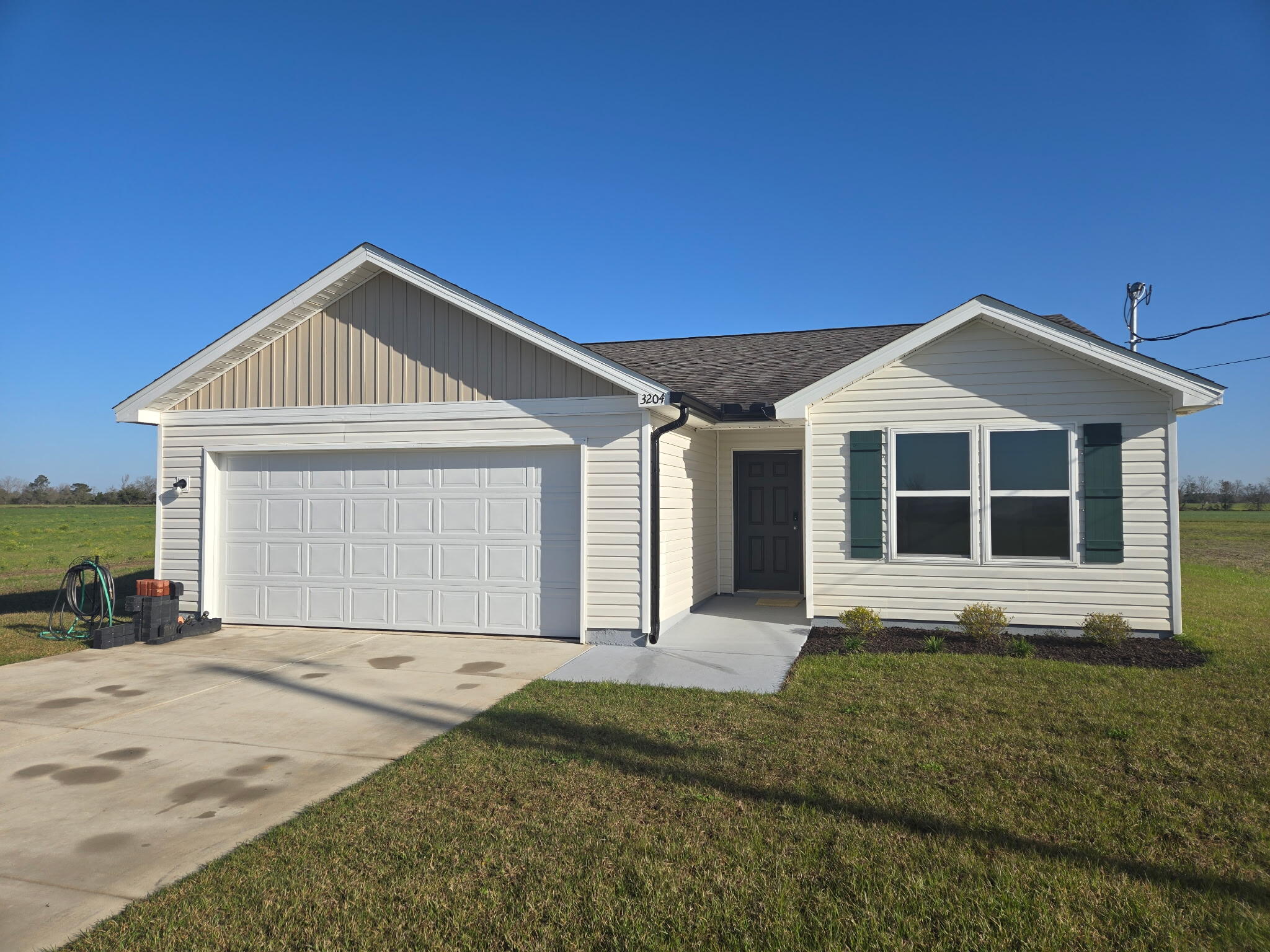 Nearly new home built in 2024 in the Shell Landing community of Jay, FL. Sought after open concept floor plan with a spacious living, dining, and kitchen. The Kitchen features granite countertops, ample cabinet space, and stainless steel appliances. The primary bedroom suite features a private bath, dual vanity sinks, and a walk-in closet. This home also includes a 10 x 12 storage building in the backyard for your convenience, and gutters have been added to the home for peace of mind. The home is built on a level and cleared one acre lot with huge potential offering ample space behind the home for a buyer to install a pool or build a large shop.