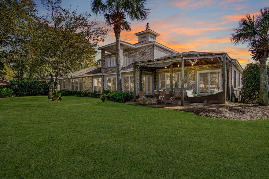 This immaculate, spacious home with majestic oaks dressed in Spanish moss with a gorgeous waterfront vista sits on an estate-sized lot of 0.83 acres on Choctawhatchee Bay in Miramar Beach, FL. Nestled in the community of Bayside, it is only minutes to Destin and 30A and almost adjacent to Sandestin, allowing unobstructed viewing of the almost nightly fireworks display from the dock. The dock features new decking and an upper sundeck big enough for parties with a boat lift for your boat and multiple slips for docking your other water toys to allow full enjoyment of the panhandle waterfront lifestyle! The expansive landscaped grounds offers a wonderful game play area for those special family gatherings.--a perfect place to hang out on beautiful Emerald Coast days to enjoy the firepit.