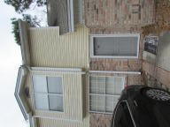 Townhome has much to offer, porcelain tile floors throughout the main floor. You will be shocked at the size of this kitchen, living room and dining room. The storage is plentifully with its coat closet, linen closet, and second floor walk-in-closet. Two enormous bedrooms each with their own full bath and walk-in closet. Added bonus of half bath, private fenced yard and laundry room